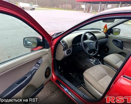 Красный ВАЗ Kalina, объемом двигателя 1.6 л и пробегом 105 тыс. км за 3100 $, фото 7 на Automoto.ua