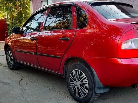 Красный ВАЗ Kalina, объемом двигателя 1.6 л и пробегом 205 тыс. км за 2800 $, фото 1 на Automoto.ua
