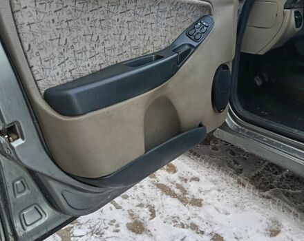 Серый ВАЗ Калина, объемом двигателя 1 л и пробегом 180 тыс. км за 2000 $, фото 3 на Automoto.ua