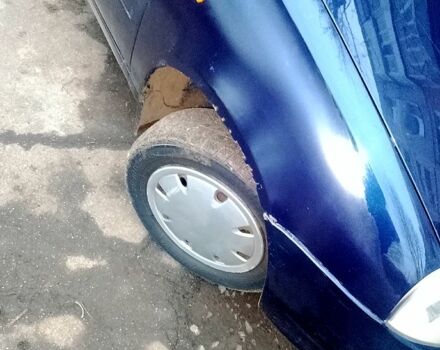 Синий ВАЗ Kalina, объемом двигателя 1.4 л и пробегом 180 тыс. км за 2400 $, фото 2 на Automoto.ua