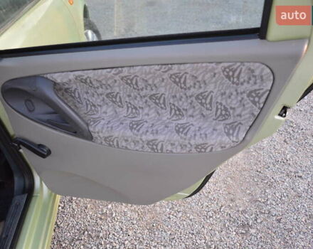 Зеленый ВАЗ Калина, объемом двигателя 1.6 л и пробегом 271 тыс. км за 2800 $, фото 10 на Automoto.ua