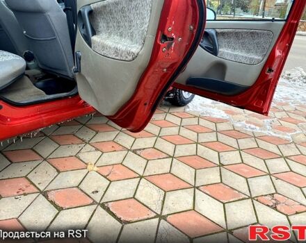 Красный ВАЗ Lada Kalina, объемом двигателя 1.6 л и пробегом 250 тыс. км за 2350 $, фото 12 на Automoto.ua