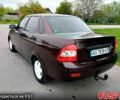 Красный ВАЗ Lada Priora, объемом двигателя 1.6 л и пробегом 220 тыс. км за 2650 $, фото 1 на Automoto.ua