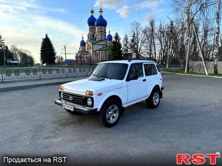 ВАЗ Нива 2006 в Первомайском на Automoto.ua Белый ВАЗ Нива, объемом двигателя 1.7 л и пробегом 160 тыс. км за 5100 $, фото 1 на Automoto.ua