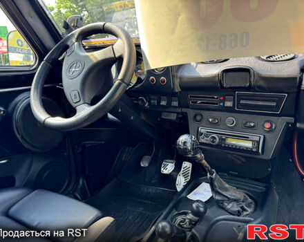 Черный ВАЗ Нива, объемом двигателя 1.6 л и пробегом 183 тыс. км за 2300 $, фото 9 на Automoto.ua