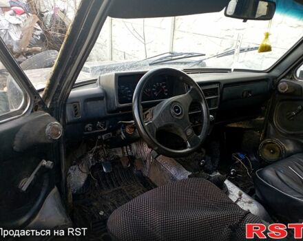 Черный ВАЗ Нива, объемом двигателя 1.7 л и пробегом 159 тыс. км за 1650 $, фото 2 на Automoto.ua