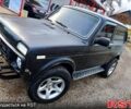 Черный ВАЗ Нива, объемом двигателя 1.7 л и пробегом 292 тыс. км за 2600 $, фото 1 на Automoto.ua