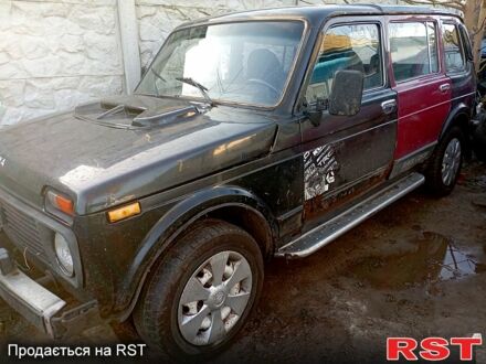 Черный ВАЗ Нива, объемом двигателя 1.7 л и пробегом 159 тыс. км за 1650 $, фото 1 на Automoto.ua