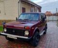 Красный ВАЗ Нива, объемом двигателя 1.6 л и пробегом 205 тыс. км за 2650 $, фото 1 на Automoto.ua