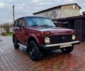 Красный ВАЗ Нива, объемом двигателя 1.6 л и пробегом 205 тыс. км за 2650 $, фото 4 на Automoto.ua
