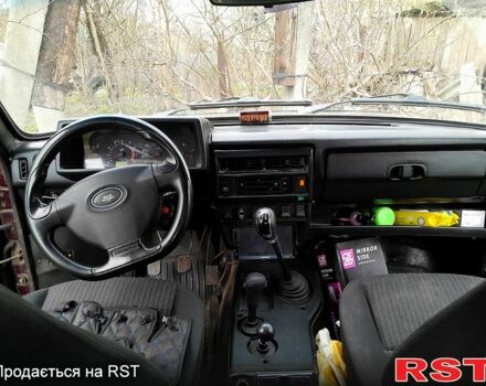 Красный ВАЗ Нива, объемом двигателя 1.6 л и пробегом 170 тыс. км за 2170 $, фото 4 на Automoto.ua
