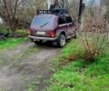 Красный ВАЗ Нива, объемом двигателя 1.6 л и пробегом 170 тыс. км за 2170 $, фото 3 на Automoto.ua