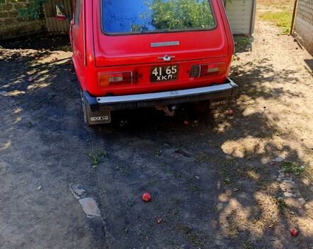 Красный ВАЗ Нива, объемом двигателя 1.6 л и пробегом 200 тыс. км за 1000 $, фото 2 на Automoto.ua