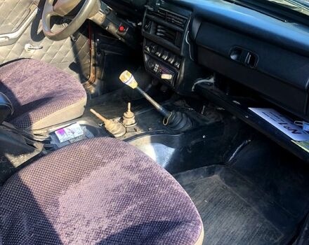 Красный ВАЗ Нива, объемом двигателя 1.9 л и пробегом 50 тыс. км за 2500 $, фото 6 на Automoto.ua