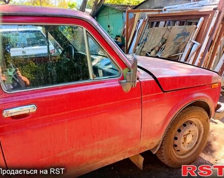 Красный ВАЗ Нива, объемом двигателя 1.6 л и пробегом 280 тыс. км за 1000 $, фото 2 на Automoto.ua