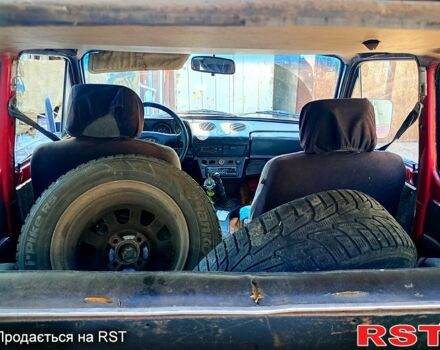 Красный ВАЗ Нива, объемом двигателя 1.6 л и пробегом 280 тыс. км за 1000 $, фото 3 на Automoto.ua