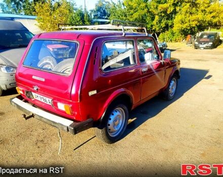 Червоний ВАЗ Нива, об'ємом двигуна 1.6 л та пробігом 215 тис. км за 1150 $, фото 1 на Automoto.ua