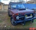 Красный ВАЗ Нива, объемом двигателя 1.6 л и пробегом 200 тыс. км за 1500 $, фото 2 на Automoto.ua