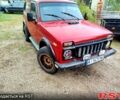Красный ВАЗ Нива, объемом двигателя 1.7 л и пробегом 221 тыс. км за 2500 $, фото 1 на Automoto.ua