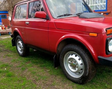 Красный ВАЗ Нива, объемом двигателя 1.7 л и пробегом 60 тыс. км за 2700 $, фото 2 на Automoto.ua