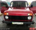 Червоний ВАЗ Нива, об'ємом двигуна 1.7 л та пробігом 292 тис. км за 2800 $, фото 1 на Automoto.ua