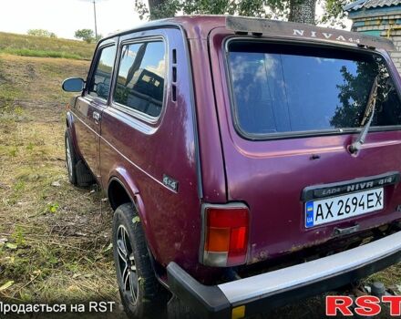 Красный ВАЗ Нива, объемом двигателя 1.7 л и пробегом 150 тыс. км за 1500 $, фото 4 на Automoto.ua