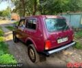 Красный ВАЗ Нива, объемом двигателя 1.7 л и пробегом 250 тыс. км за 1550 $, фото 3 на Automoto.ua