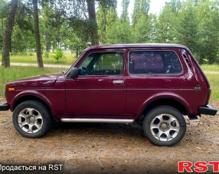 Червоний ВАЗ Нива, об'ємом двигуна 1.7 л та пробігом 195 тис. км за 1950 $, фото 1 на Automoto.ua