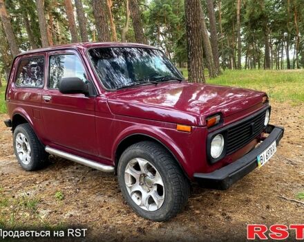 Червоний ВАЗ Нива, об'ємом двигуна 1.7 л та пробігом 195 тис. км за 1950 $, фото 5 на Automoto.ua