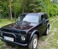 Красный ВАЗ Нива, объемом двигателя 1.7 л и пробегом 170 тыс. км за 2000 $, фото 1 на Automoto.ua