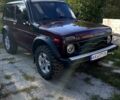 Красный ВАЗ Нива, объемом двигателя 1.6 л и пробегом 183 тыс. км за 7000 $, фото 1 на Automoto.ua