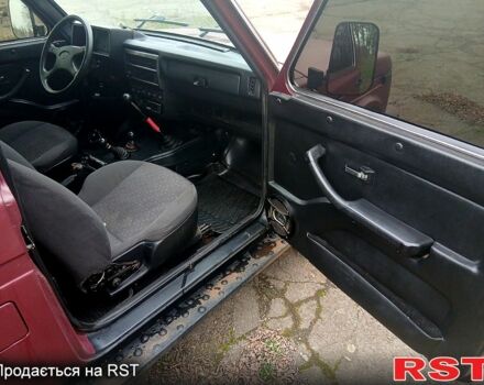 Красный ВАЗ Нива, объемом двигателя 1.7 л и пробегом 150 тыс. км за 4500 $, фото 7 на Automoto.ua
