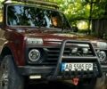 Червоний ВАЗ Нива, об'ємом двигуна 1.7 л та пробігом 150 тис. км за 4100 $, фото 1 на Automoto.ua