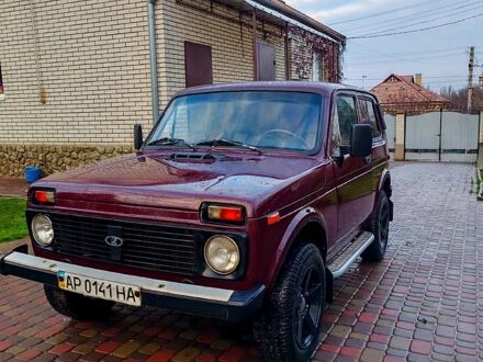 Красный ВАЗ Нива, объемом двигателя 1.6 л и пробегом 205 тыс. км за 2650 $, фото 1 на Automoto.ua