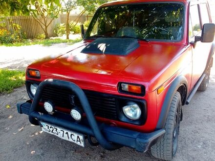 Красный ВАЗ Нива, объемом двигателя 1.7 л и пробегом 123 тыс. км за 1350 $, фото 1 на Automoto.ua