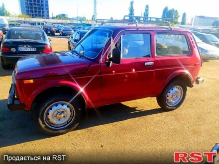 Червоний ВАЗ Нива, об'ємом двигуна 1.6 л та пробігом 215 тис. км за 1150 $, фото 1 на Automoto.ua