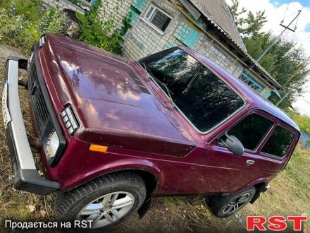 ВАЗ Нива 2002 в Сахновщине на Automoto.ua Красный ВАЗ Нива, объемом двигателя 1.7 л и пробегом 150 тыс. км за 1500 $, фото 1 на Automoto.ua