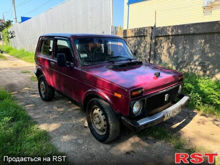 Красный ВАЗ Нива, объемом двигателя 1.7 л и пробегом 250 тыс. км за 1550 $, фото 1 на Automoto.ua
