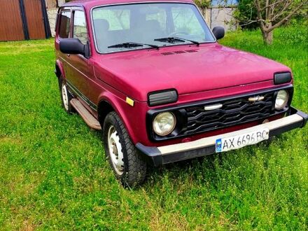 ВАЗ Нива 2004 в Новой Водолаге на Automoto.ua Красный ВАЗ Нива, объемом двигателя 1.7 л и пробегом 111 тыс. км за 1800 $, фото 1 на Automoto.ua