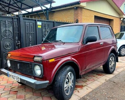 Красный ВАЗ Нива, объемом двигателя 1.7 л и пробегом 117 тыс. км за 2800 $, фото 1 на Automoto.ua