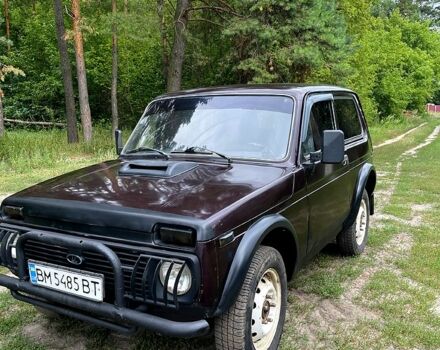 Красный ВАЗ Нива, объемом двигателя 1.7 л и пробегом 170 тыс. км за 2000 $, фото 1 на Automoto.ua