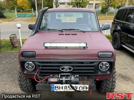 Червоний ВАЗ Нива, об'ємом двигуна 1.7 л та пробігом 245 тис. км за 3800 $, фото 1 на Automoto.ua