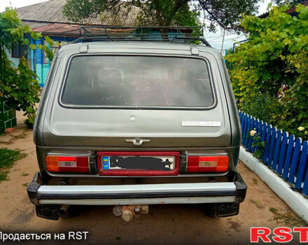 Серый ВАЗ Нива, объемом двигателя 1.6 л и пробегом 270 тыс. км за 2100 $, фото 1 на Automoto.ua