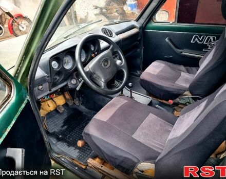 Зеленый ВАЗ Нива, объемом двигателя 1.6 л и пробегом 350 тыс. км за 2200 $, фото 4 на Automoto.ua