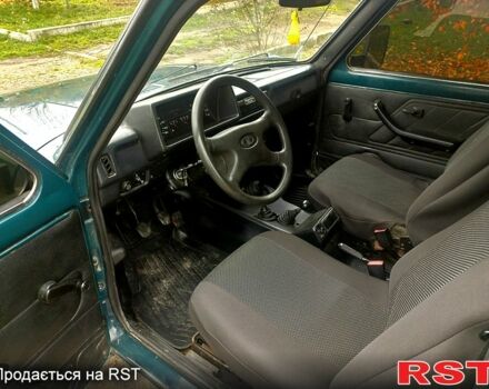 Зеленый ВАЗ Нива, объемом двигателя 1.7 л и пробегом 186 тыс. км за 3000 $, фото 2 на Automoto.ua