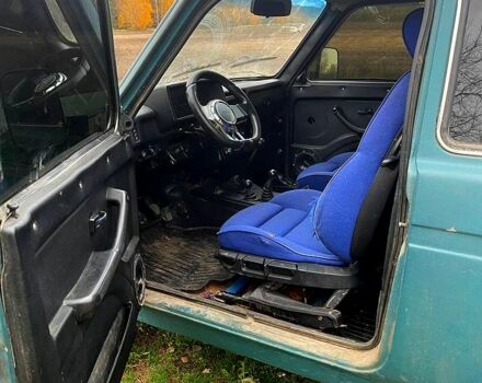 Зеленый ВАЗ Нива, объемом двигателя 1.7 л и пробегом 235 тыс. км за 2700 $, фото 6 на Automoto.ua