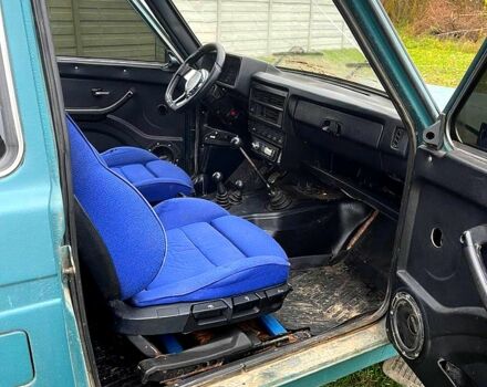 Зеленый ВАЗ Нива, объемом двигателя 1.7 л и пробегом 235 тыс. км за 2700 $, фото 5 на Automoto.ua