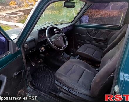 Зелений ВАЗ Нива, об'ємом двигуна 1.7 л та пробігом 186 тис. км за 3000 $, фото 2 на Automoto.ua