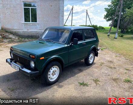 Зеленый ВАЗ Нива, объемом двигателя 1.7 л и пробегом 259 тыс. км за 2750 $, фото 1 на Automoto.ua