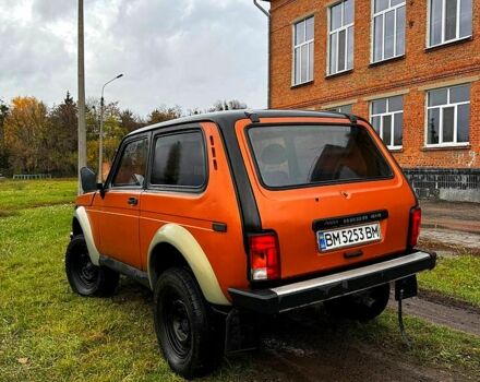 Оранжевый ВАЗ Нива, объемом двигателя 1.6 л и пробегом 300 тыс. км за 1999 $, фото 1 на Automoto.ua